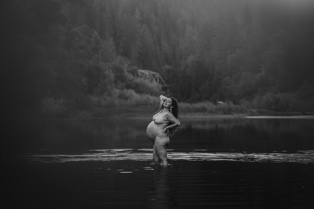 Black and white nude pregnancy maternity portrait session of a stunning mother in this beautiful Russian River photographed by renowned intimate and authentic photographer in San Francisco Bay Area, Kati Douglas of Xilo Photography
