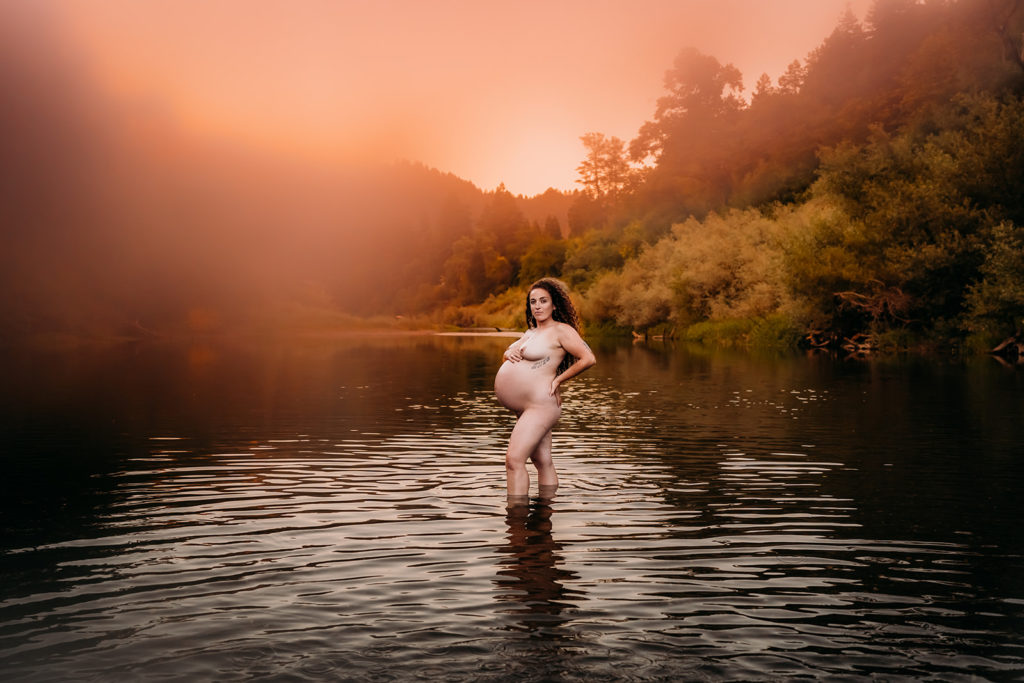 Russian River nude maternity photoshoot with a mother posing confidently and showing off her gorgeous baby bump and curves during her nude pregnancy photoshoot with Inclusive Photographer who specializes in documentary photography, Xilo Photography