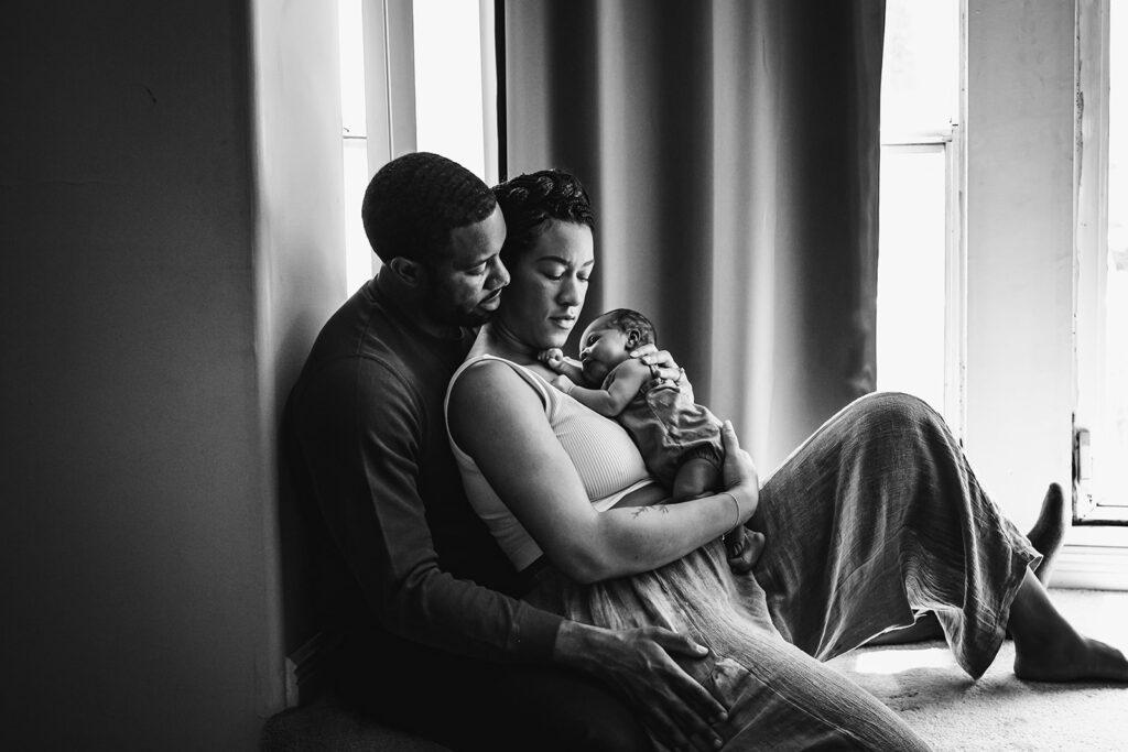 This sweet lifestyle newborn session with a documentary style spin was so incredibly beautiful. This portrait of a newborn, mother and father. From Xilo Photography, San Francisco Bay Area Documentary Newborn and Family Photographer.